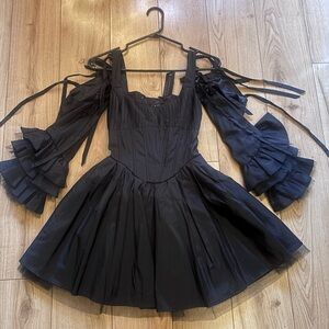 Widow dress with detachable bell sleeve arms.